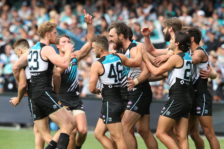 AFL 2016 Rd 01 - Port Adelaide v St Kilda ADELAIDE, AUSTRALIA - MARCH 27: Charlie Dixon of the Power celebrates his first goal for the club during the 2016 AFL Round 01 match between Port Adelaide Power and the St Kilda Saints at the Adelaide Oval, Adelaide on March 27, 2016. (Photo by James Elsby/AFL Media)